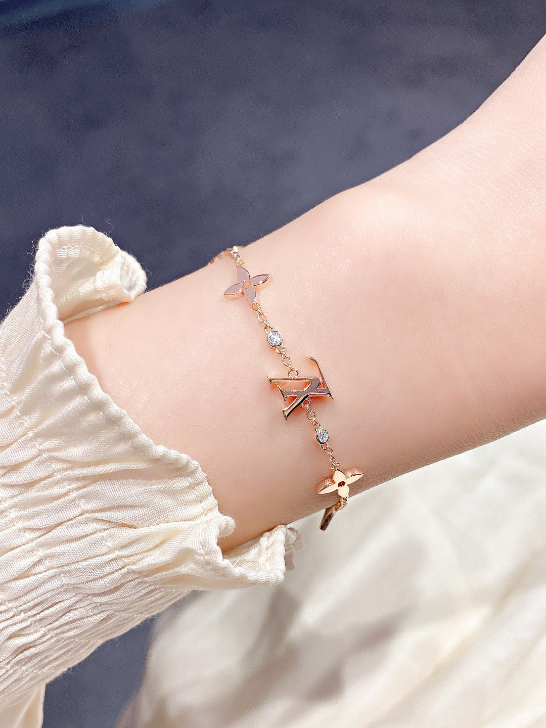 LOUIS VUITTON STAR AND SUN 7 MOTIFS GOLD BRACELET