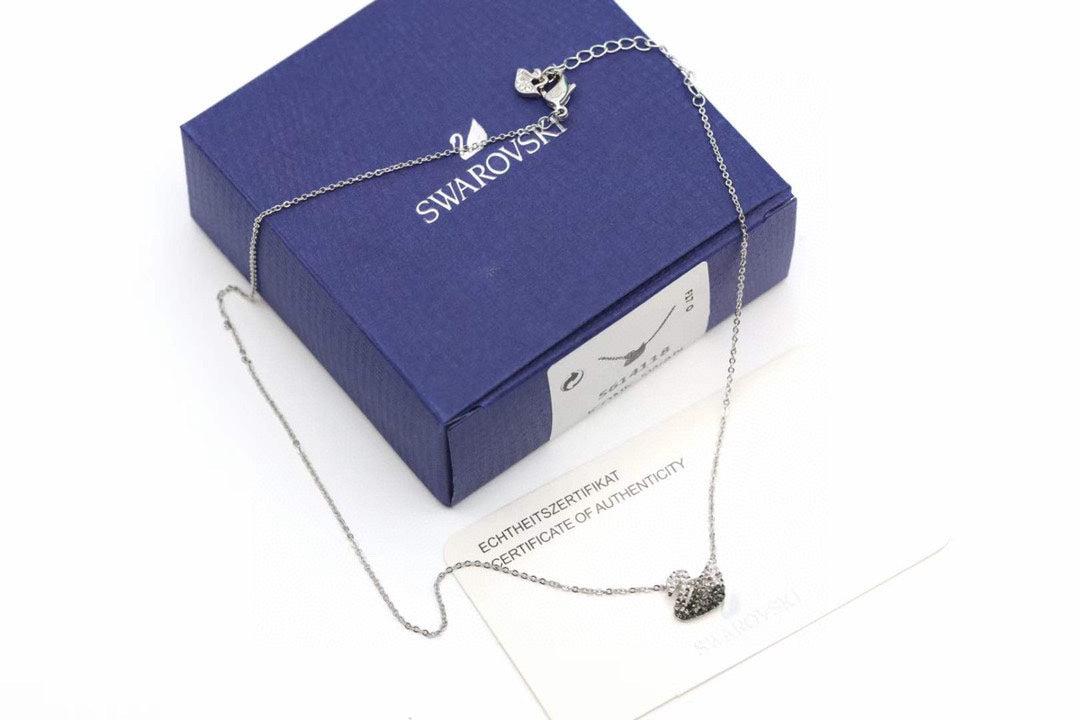 Swarovski Swan Pendant Necklace in Gold-Tone – Black Detail