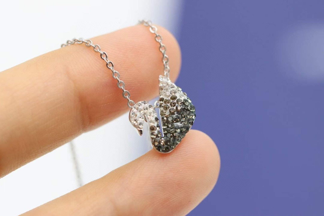 Swarovski Swan Pendant Necklace in Gold-Tone – Black Detail