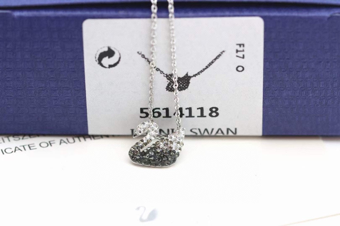 Swarovski Swan Pendant Necklace in Gold-Tone – Black Detail