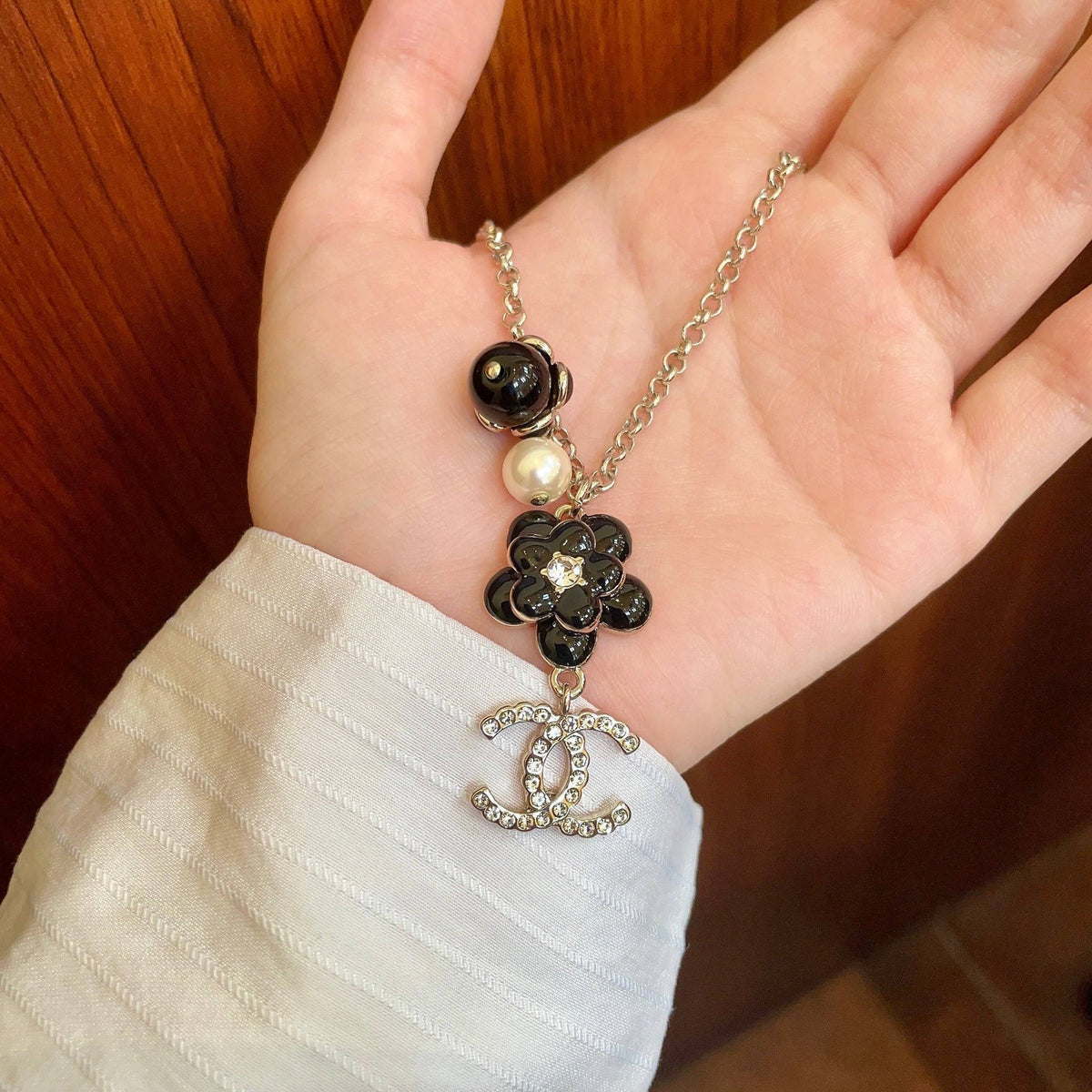 Chanel 26s Double C Logo Black Flower & Pearl Charm Pendant Necklace With Crystal Detail In Gold Metal 631012