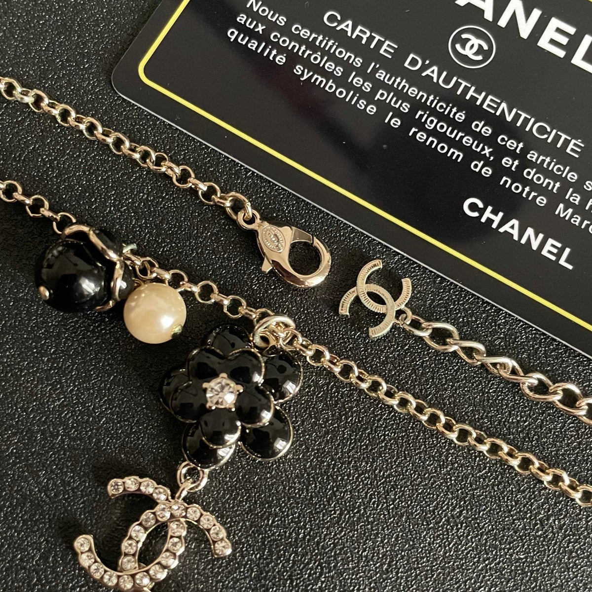 Chanel 26s Double C Logo Black Flower & Pearl Charm Pendant Necklace With Crystal Detail In Gold Metal 631012