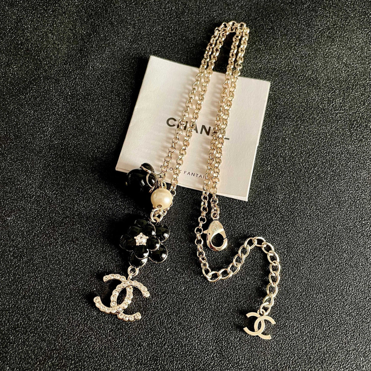 Chanel 26s Double C Logo Black Flower & Pearl Charm Pendant Necklace With Crystal Detail In Gold Metal 631012